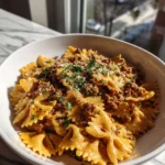 Cajun Cream Cheese Alfredo Bowties with Spiced Ground Beef Recipe to Spice Up Your Dinner - Featured Image