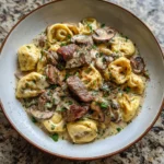Cracked Garlic Steak Tortellini in Creamhouse Sauce Recipe to Savor - Featured Image