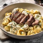 Indulge in Garlic Butter Steak and Creamy Alfredo Tortellini Delight - Featured Image