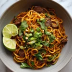 Irresistible Caramelized Beef Peanut Noodles with Zesty Lime and Ginger Flair - Featured Image